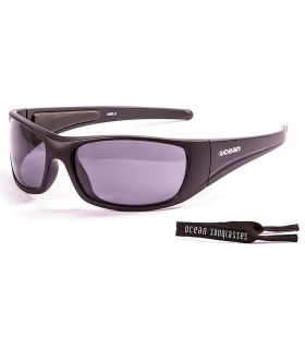 Gafas de sol Ocean Bermuda Mate Black Smoke con patillas flotantes de policarbonato ideales para el agua.