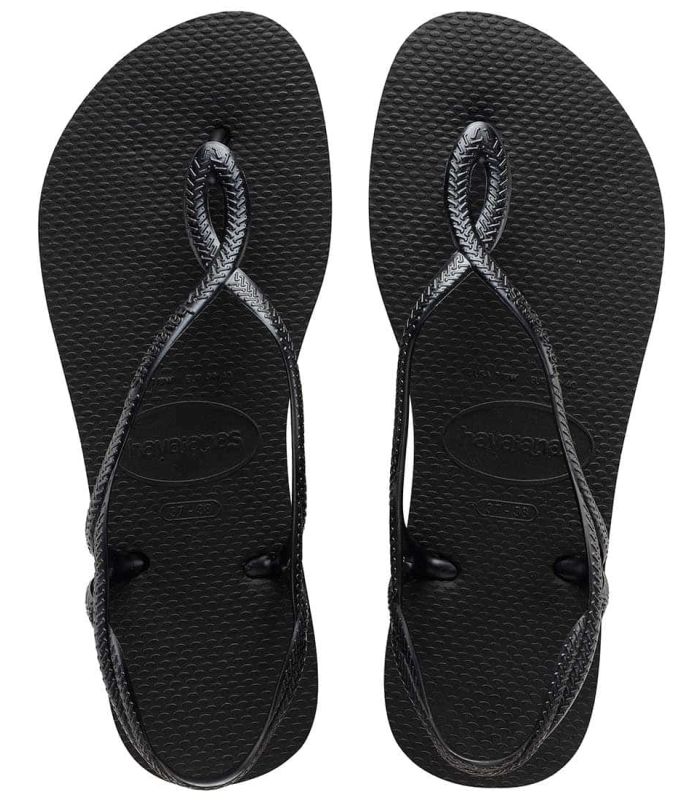 Sandalias Havaianas Luna para mujer en color negro con tira envolvente y suela de goma antideslizante.