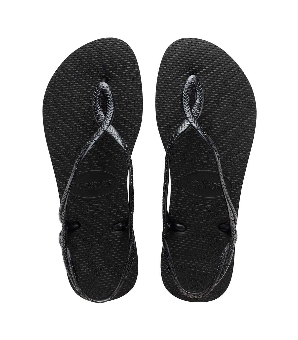 Sandalias Havaianas Luna para mujer en color negro con tira envolvente y suela de goma antideslizante.