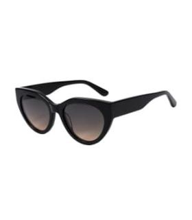 Gafas de sol polarizadas Ocean Macasar con montura negra y lentes ahumadas para mujer deportista.
