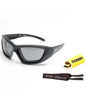 Gafas de sol deportivas polarizadas Ocean Biarritz Kids negro mate y lentes humo para niños.